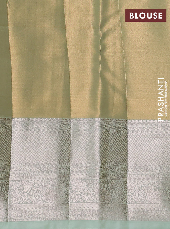 Semi kanchipuram tissue silk saree pista green with allover silver zari woven brocade weaves and zari woven border