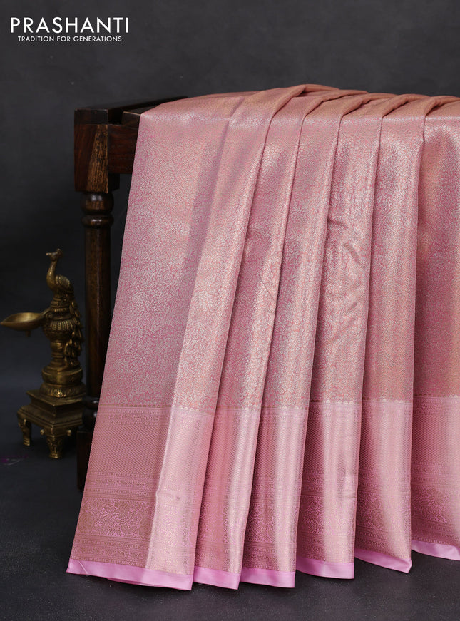 Semi kanchipuram tissue silk saree light pink with allover silver zari woven brocade weaves and zari woven border