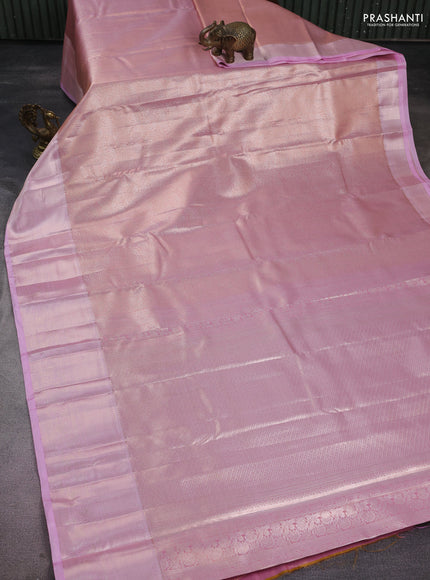 Semi kanchipuram tissue silk saree light pink with allover silver zari woven brocade weaves and zari woven border