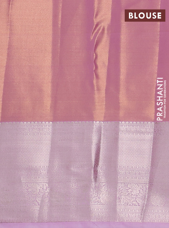 Semi kanchipuram tissue silk saree light pink with allover silver zari woven brocade weaves and zari woven border