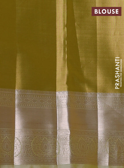 Semi kanchipuram tissue silk saree lime yellow with allover silver zari woven brocade weaves and zari woven border