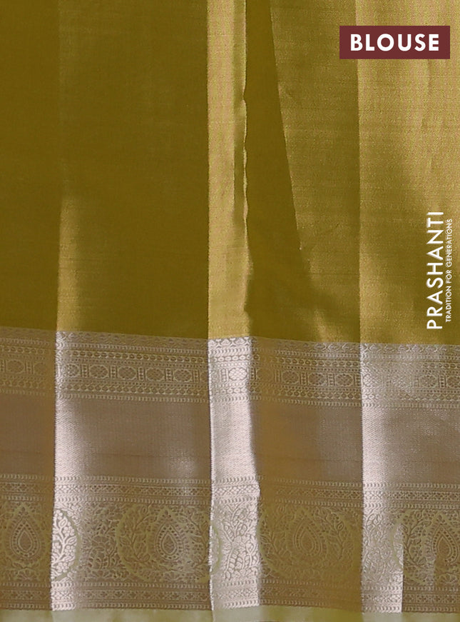 Semi kanchipuram tissue silk saree lime yellow with allover silver zari woven brocade weaves and zari woven border