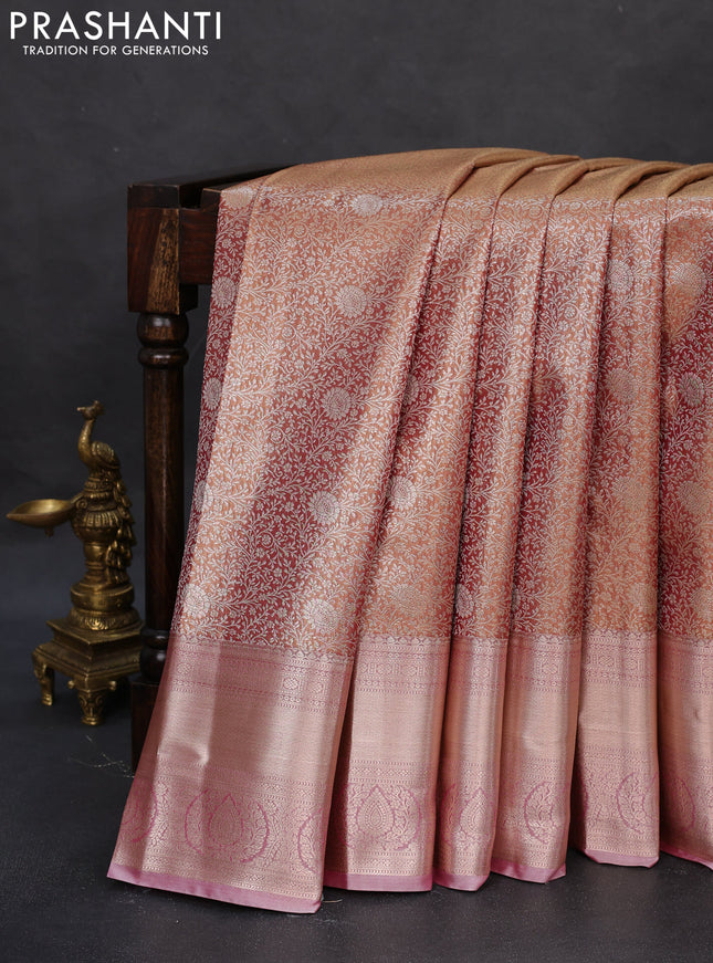 Semi kanchipuram tissue silk saree dual shade of pinkish gold and pastel pink with allover silver zari woven brocade weaves and zari woven border