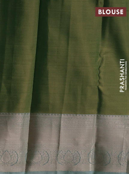 Semi kanchipuram tissue silk saree dual shade of green with allover silver zari woven brocade weaves and zari woven border