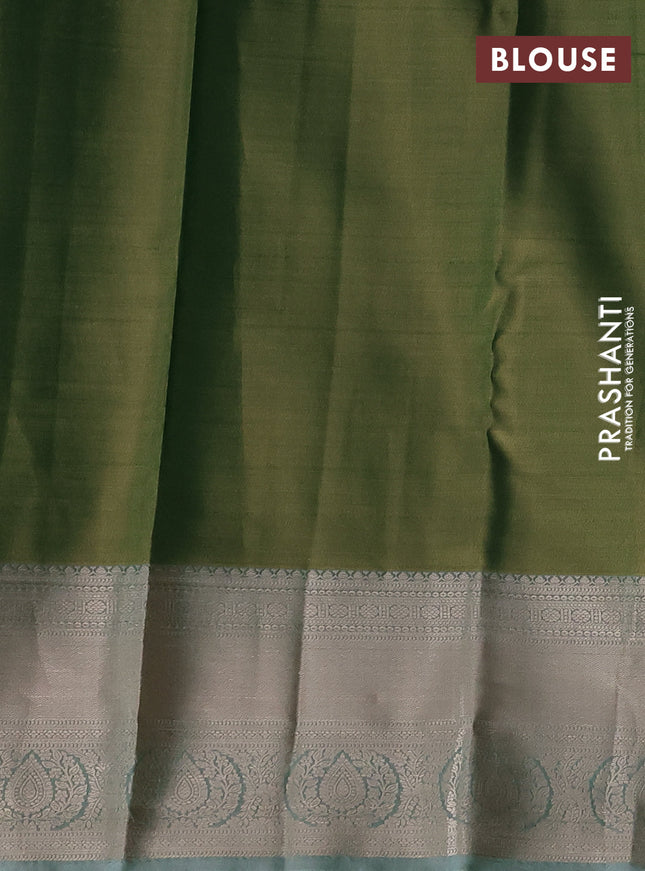 Semi kanchipuram tissue silk saree dual shade of green with allover silver zari woven brocade weaves and zari woven border