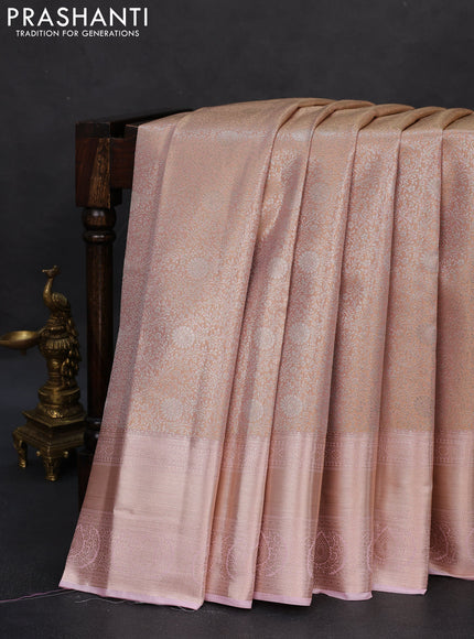 Semi kanchipuram tissue silk saree pastel peach orange and baby pink with allover silver zari woven brocade weaves and zari woven border
