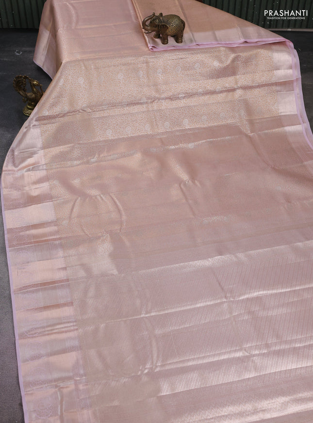 Semi kanchipuram tissue silk saree pastel peach orange and baby pink with allover silver zari woven brocade weaves and zari woven border