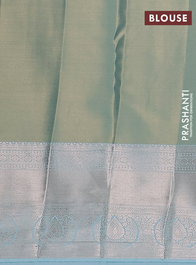 Semi kanchipuram tissue silk saree dual shade of pastel blue with allover silver zari woven brocade weaves and zari woven border