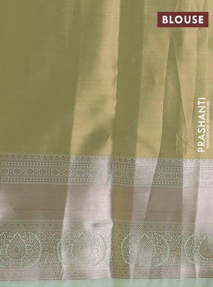 Semi kanchipuram tissue silk saree pista green with allover silver zari woven brocade weaves and zari woven border