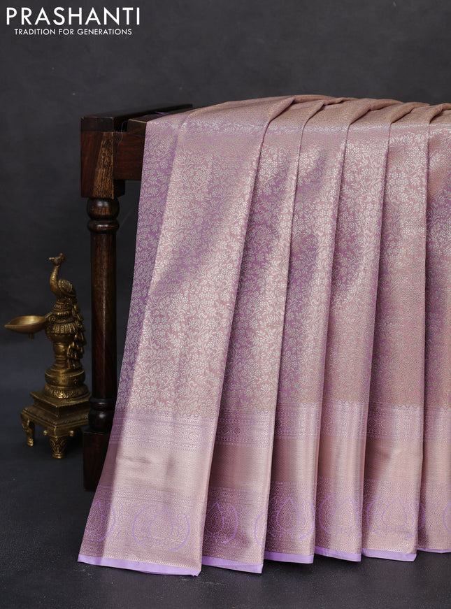 Semi kanchipuram tissue silk saree mild lavender and lavender with allover silver zari woven brocade weaves and zari woven border