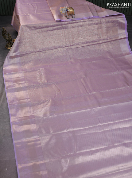 Semi kanchipuram tissue silk saree mild lavender and lavender with allover silver zari woven brocade weaves and zari woven border