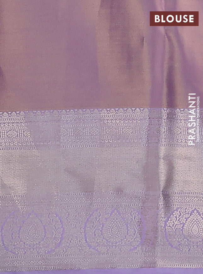 Semi kanchipuram tissue silk saree mild lavender and lavender with allover silver zari woven brocade weaves and zari woven border