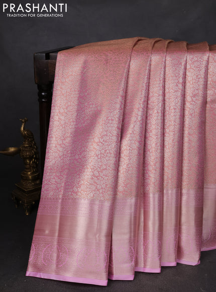 Semi kanchipuram tissue silk saree mild peach pink and light pink with allover silver zari woven brocade weaves and zari woven border