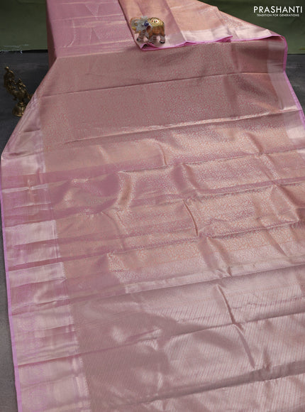 Semi kanchipuram tissue silk saree mild peach pink and light pink with allover silver zari woven brocade weaves and zari woven border