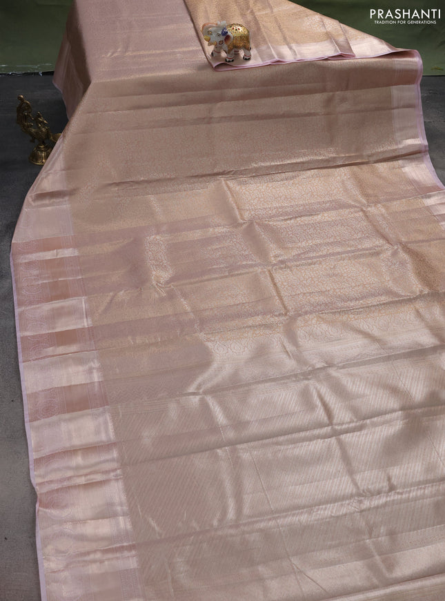 Semi kanchipuram tissue silk saree pastel peach and baby pink with allover silver zari woven brocade weaves and zari woven border