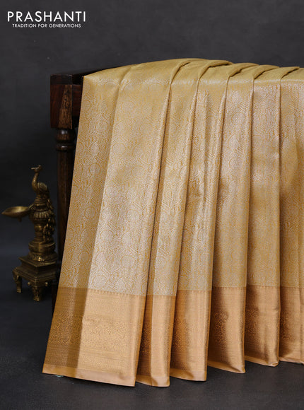 Semi kanchipuram tissue silk saree mustard yellow and sandal with allover silver zari woven brocade weaves and rich zari woven border