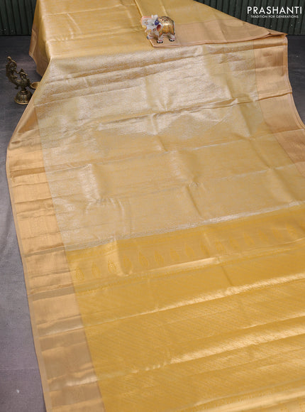 Semi kanchipuram tissue silk saree mustard yellow and sandal with allover silver zari woven brocade weaves and rich zari woven border