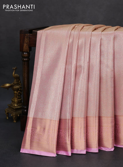 Semi kanchipuram tissue silk saree light pink with allover silver zari woven brocade weaves and rich zari woven border