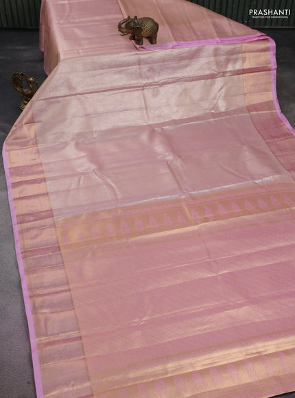 Semi kanchipuram tissue silk saree light pink with allover silver zari woven brocade weaves and rich zari woven border