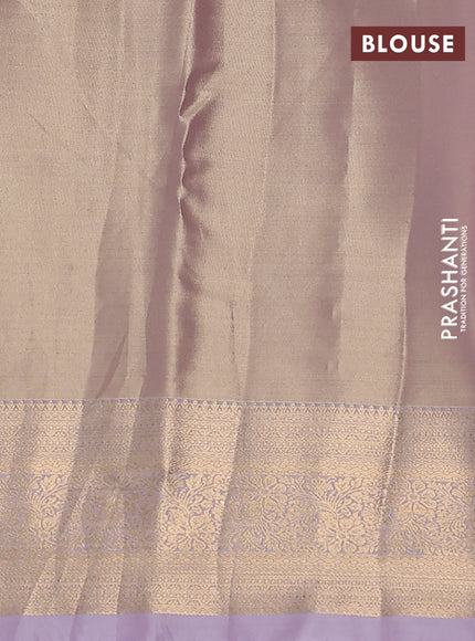 Semi kanchipuram tissue silk saree beige and lavender with allover silver zari woven brocade weaves and rich zari woven border