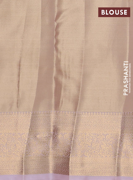 Semi kanchipuram tissue silk saree sandal and baby pink with allover silver zari woven brocade weaves and rich zari woven border