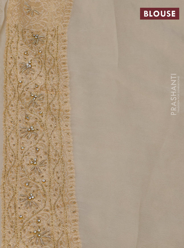 Banarasi georgette saree off white with allover jaal weaves & stone work and zardosi work border