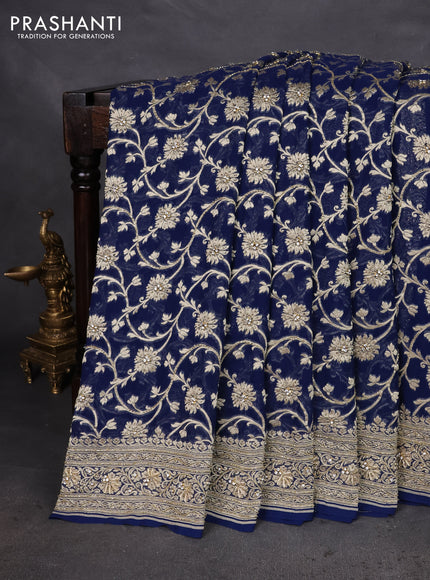 Banarasi georgette saree peacock blue with allover jaal weaves & stone work and zardosi work border