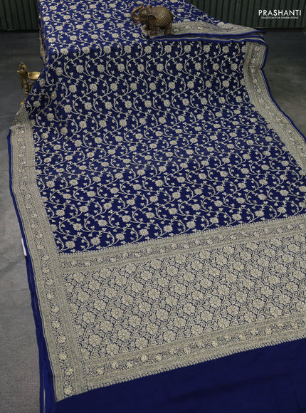 Banarasi georgette saree peacock blue with allover jaal weaves & stone work and zardosi work border