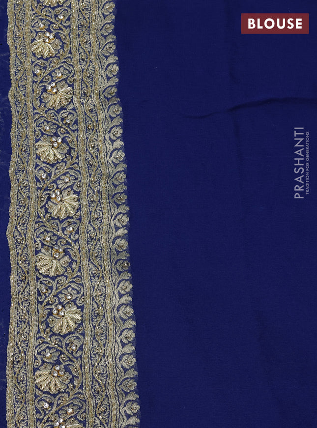 Banarasi georgette saree peacock blue with allover jaal weaves & stone work and zardosi work border