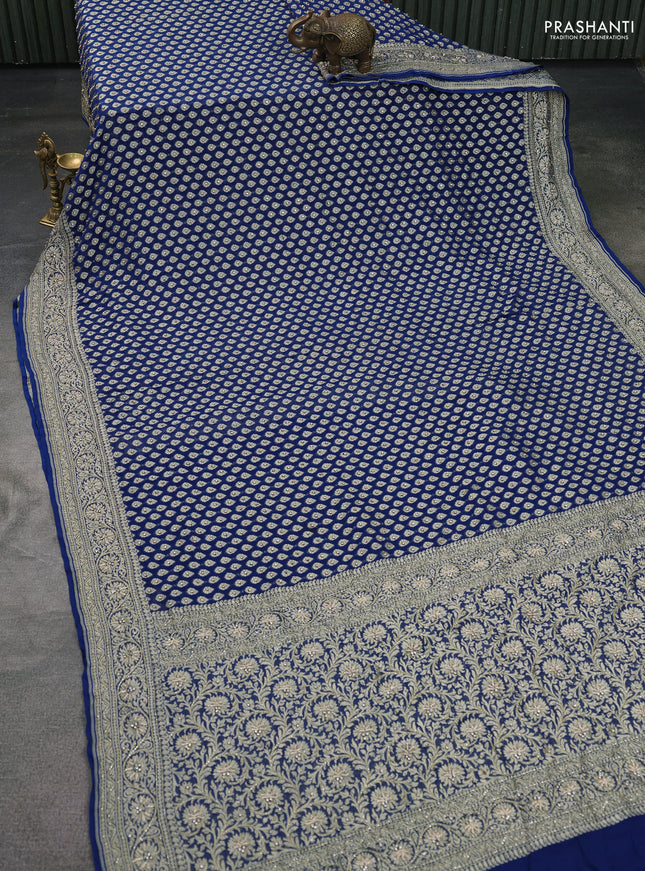Banarasi georgette saree peacock blue with woven buttas & stone work and zardosi work border