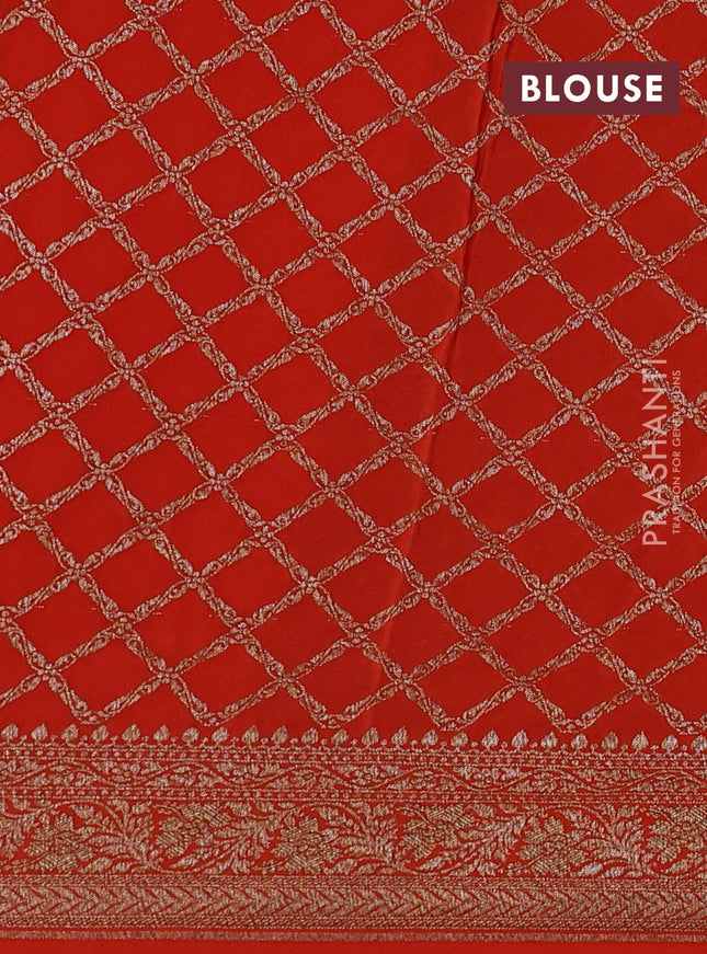 Banarasi crepe saree orange with half & half style and woven border