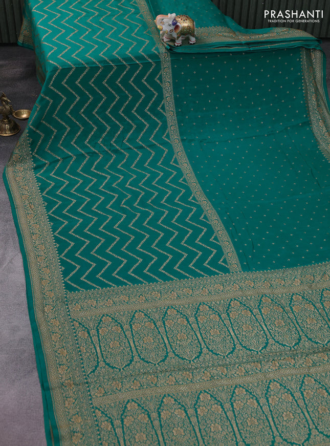 Banarasi crepe saree teal green with half & half style and woven border