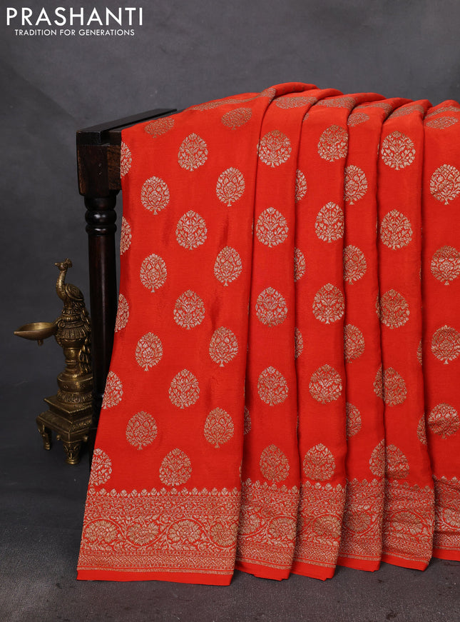 Banarasi crepe saree orange with half & half style and woven border