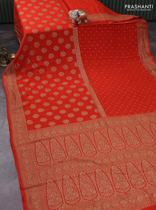 Banarasi crepe saree orange with half & half style and woven border