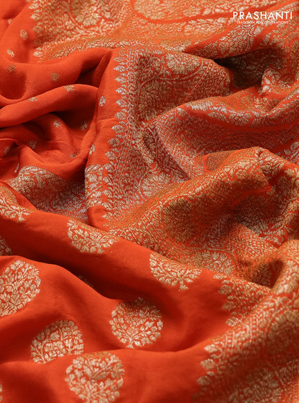 Banarasi crepe saree orange with half & half style and woven border