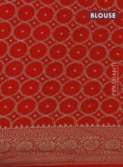 Banarasi crepe saree orange with half & half style and woven border