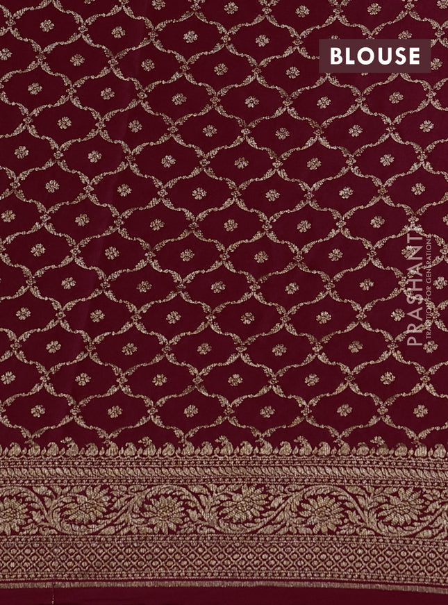 Banarasi crepe saree maroon with half & half style and woven border