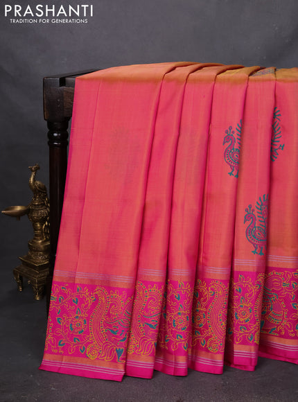 Uppada block printed silk saree dual shade of yellowish pink and pink with peacock butta prints and zari woven kalamkari printed border