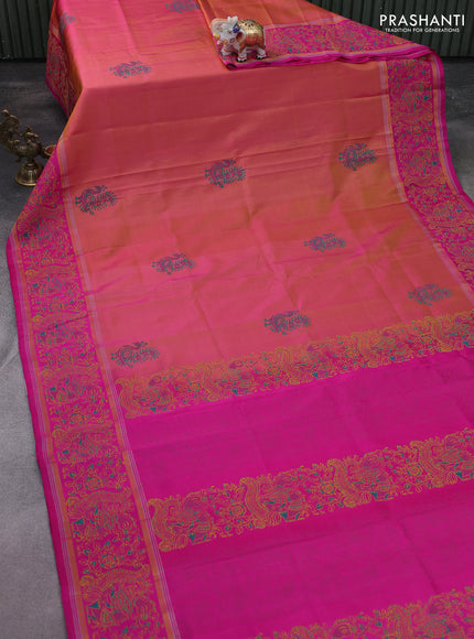 Uppada block printed silk saree dual shade of yellowish pink and pink with peacock butta prints and zari woven kalamkari printed border