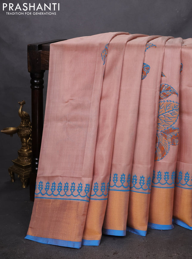Uppada block printed silk saree pastel peach and cs blue with leaf butta prints and zari woven border