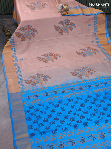 Uppada block printed silk saree pastel peach and cs blue with leaf butta prints and zari woven border