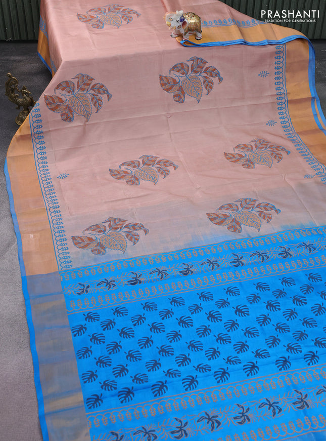Uppada block printed silk saree pastel peach and cs blue with leaf butta prints and zari woven border