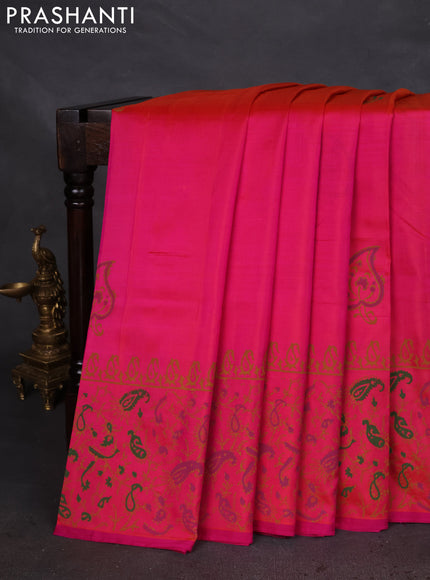 Uppada block printed silk saree dual shade of pinkish orange and pink with butta prints and long printed border