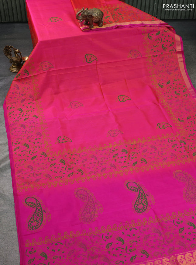 Uppada block printed silk saree dual shade of pinkish orange and pink with butta prints and long printed border