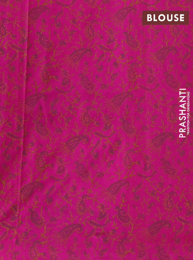 Uppada block printed silk saree dual shade of pinkish orange and pink with butta prints and long printed border