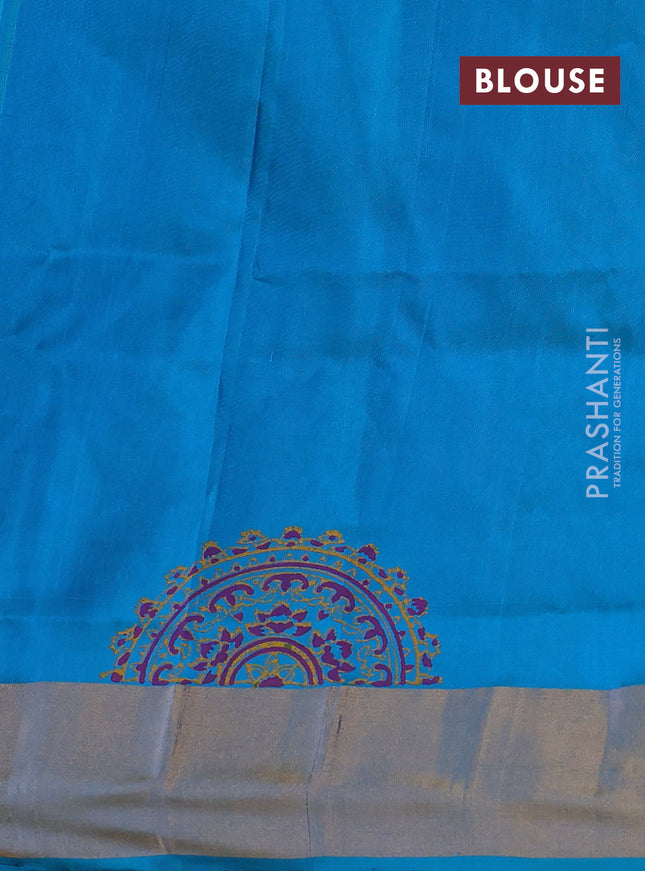 Uppada block printed silk saree purple and teal blue with floral butta prints and zari woven border