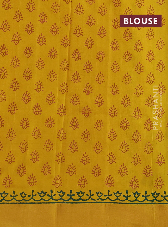 Uppada block printed silk saree green and yellow with floral butta prints and zari woven border