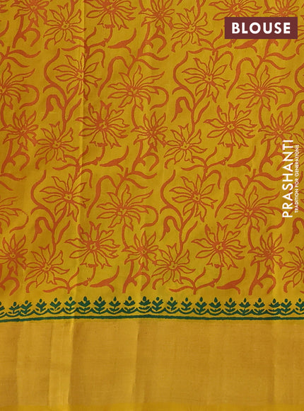 Uppada block printed silk saree green and yellow with butta prints and long printed zari border