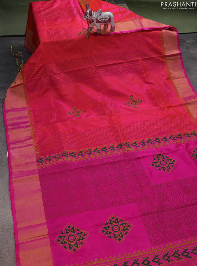 Uppada block printed silk saree dual shade of pinkish orange and pink with zig zag prints and zari woven border