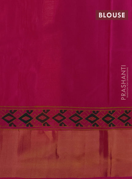 Uppada block printed silk saree dual shade of pinkish orange and pink with zig zag prints and zari woven border